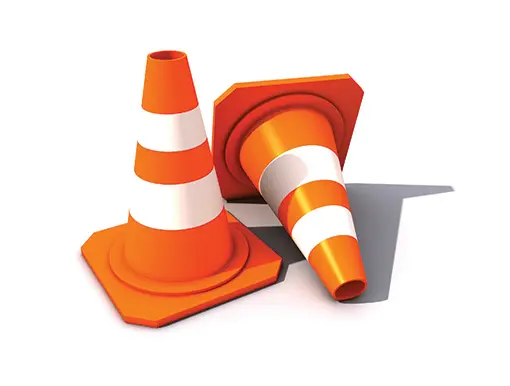 Two Orange Safety Cones, One Knocked Over.